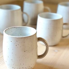 speckled white cups