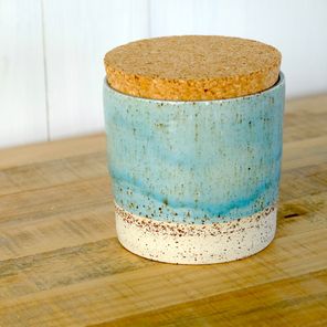 aqua-blue ceramic pot with cork lid