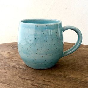 aqua-blue cup with handle